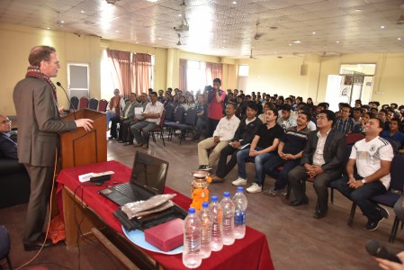 German Ambassador speaking to HCOE students